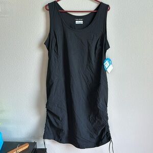 Columbia black dress. Knee length with side “draw strings”. Size XL. NWT